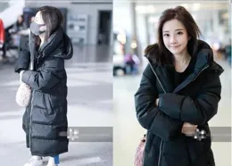 看了49歲劉敏濤穿羽絨服，我發現，羽絨服搭配雪地靴，溫暖高級！