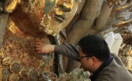 重慶工人維修800年前觀音像，無意觸發機關，專家開啟後發現驚喜