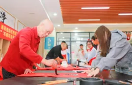 玉塘街道田寮社群開展義寫春聯活動